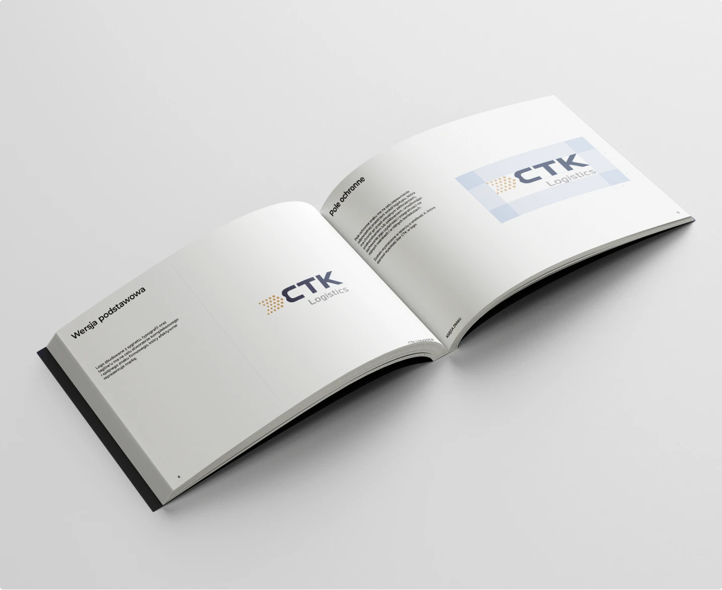 CTK Logistics prezentuje elegancki brandbook z ciemnoniebieską okładką i złotymi akcentami, podkreślającymi nowoczesny i profesjonalny charakter marki.