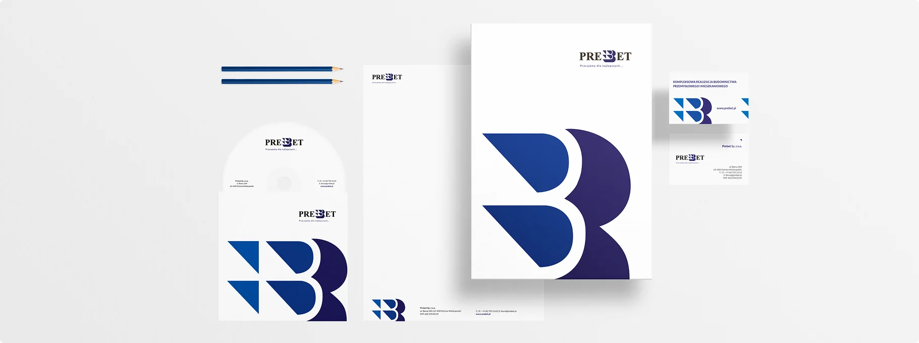 Logo firmy Trazmet Lager Technik na białej elewacji z nowoczesnym, minimalistycznym designem. Czerwone i niebieskie akcenty podkreślają dynamiczny charakter marki.